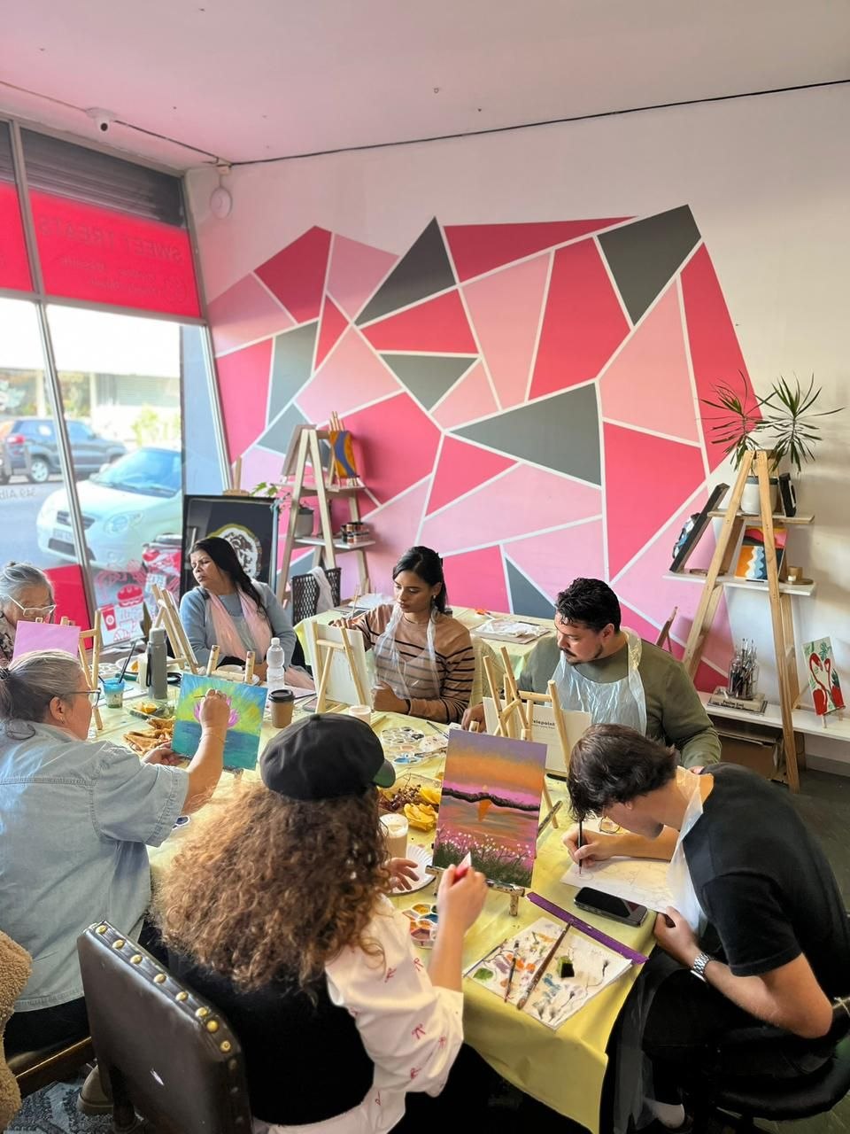 Busy creative table inside Life Is Good Café
